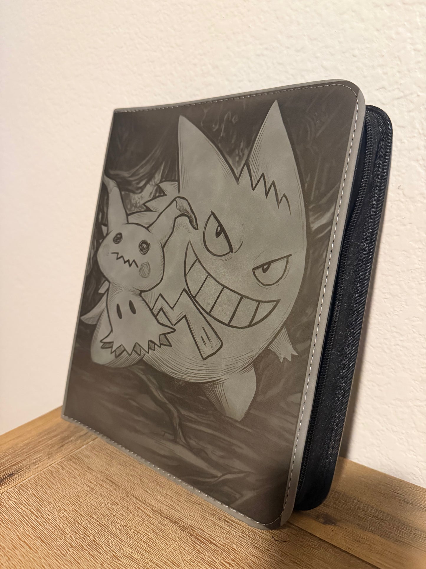 4 Pocket Gray Top Loader Binder featuring Gengar and Mimikyu